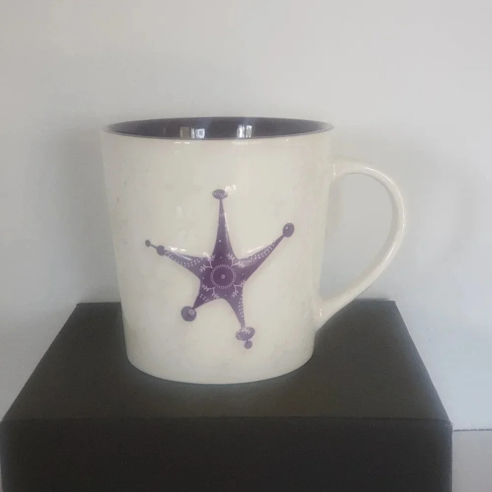 Starbucks Coffee Holiday 2006 Large Purple/White with Raised Star  Coffee mug.